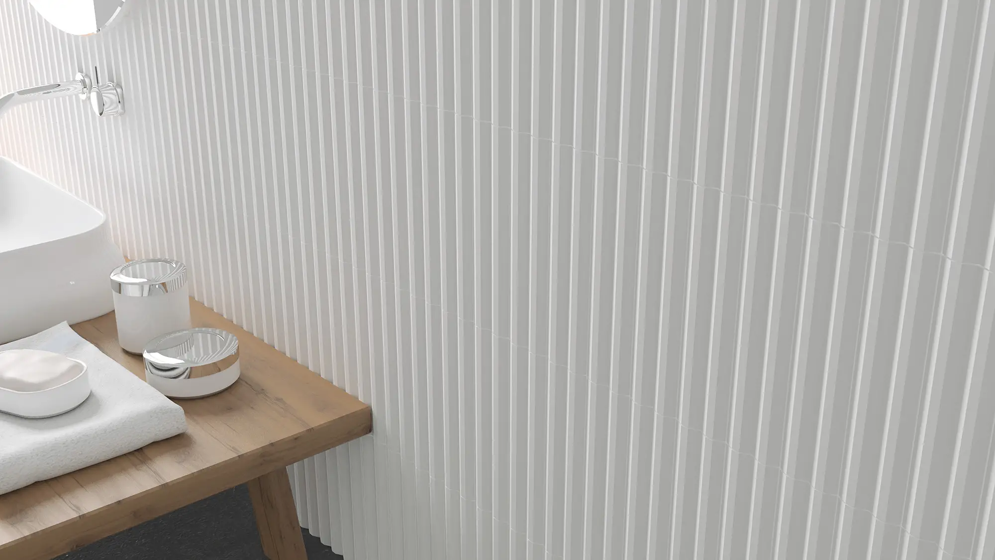 Ściana w łazience wyłożona białymi płytkami 3D ze stołem z umywalką