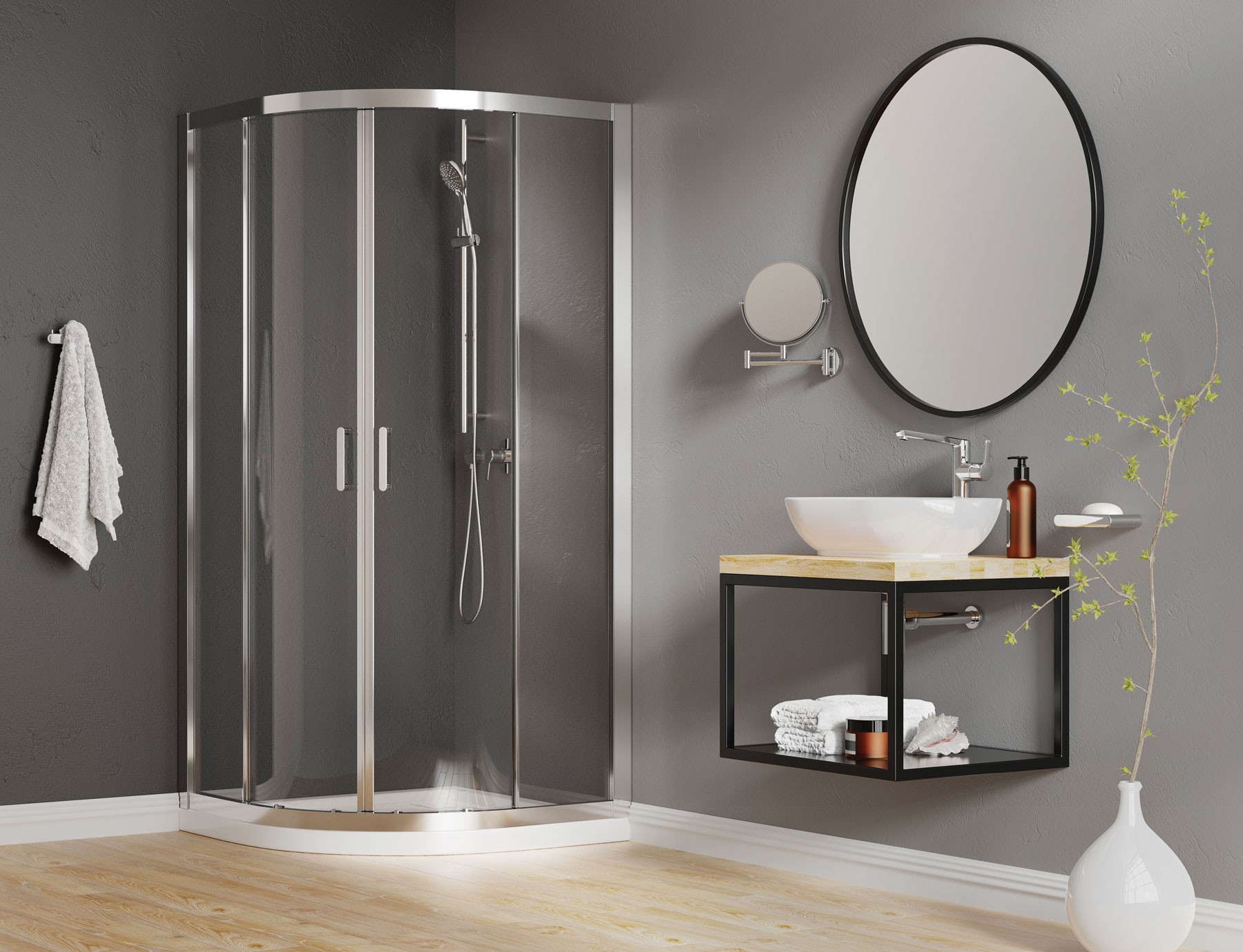 Łazienka z półokrągłą kabiną prysznicową, konsolą z umywalką nablatową, okrągłym lustrem w czarnej ramie i armaturą w kolorze chromu
