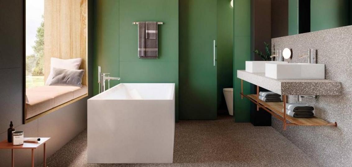 Przestronna łazienka z płytkami lastryko ROCA Pigment Gris i zielonymi ścianami