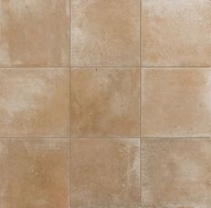 małe kwadratowe płytki w kolorze piaskowegobeżu