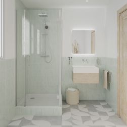 Łazienka ze ścianami wyłożonymi miętowymi cegiełkami Alchemist Sage z kabiną prysznicową, wiszącą półką z umywalką, lustrem i drzwiami