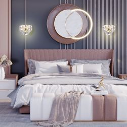 Elegancka sypialnia z dużym ł&oacute;żkiem i dwoma złotymi kinkietami Luxuria