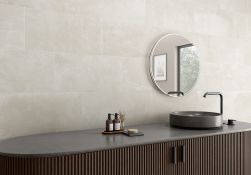 łazienka, okrągła umywalka, okrągłe lustro, na ścianie płytki antibes ivory