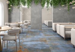 restauracja w nowoczesnym stylu, wygodne kanapy i krzesła, na podłodze płytki z kolekcji Oxyde model bleu