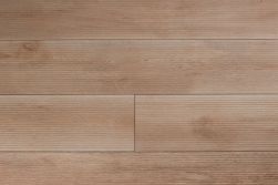 Podłoga ułożona z płytek imitujących drewno brązowych ze żłobieniami At.Boreal Deck Miel 23x120