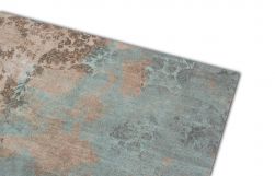 Szczegóły powierzchni płytki dekoracyjnej imitującej stary dywan Carpet Bahdad Green 50x100