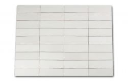 Kompozycja wielu białych cegiełek ściennych matowych Magma White 6,5x20