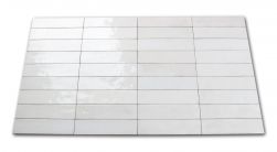 Kompozycja wielu białych cegiełek ściennych w połysku Tribeca Gypsum White 6x24,6
