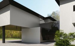 Elewacja nowoczesnego domu wyłożona białymi płytkami dekoracyjnymi Luce Pearl