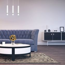 Salon z niebieską kanapą, okrągłym stolikiem, komodą i białą lampą wiszącą Joker White