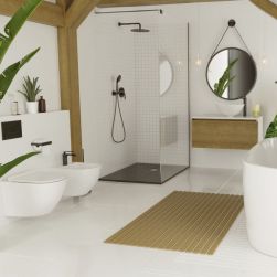 Biała łazienka z kabiną prysznicową ze ścianką prysznicową Walk In Fix z czarnymi profilami, czarnym zestawem prysznicowym, białą wanną, miską WC i bidetem, szafką wiszącą z umywalką nablatową i okrągłym lustrem