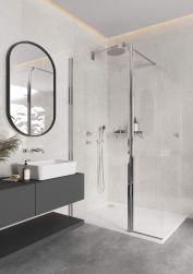 Minimalistyczna łazienka w szarości z ciemną szafką wiszącą z białą umywalką nablatową Deante Hiacynt New z baterią podtynkową, lustrem i kabiną prysznicową