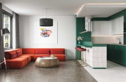 Salon połączony z kuchnią, w rogu przy oknie pomarańczowa kanapa, w części salonu na podłodze Terrazzo Anthracite Natural 59,2x59,2 płytka imitująca lastryko