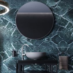 Ciemna łazienka z szarą umywalką nablatową okrągłą Molis Grey na czarnej szafce z okrągłym lustrem