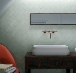 Łazienka, brązowa szafka, na szafce umywalka wolnostojąca w białym kolorze, przy ścianie w rogu fotel z ręcznikami, na ścianie podłużne lustro i płytki Village Mint 6,5x13,2 cegiełka ścienna