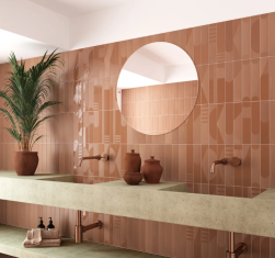 Łazienka, kamienny blat, na blacie dekoracje, dwie umywalki, okrągłe lustro, na ścianie matowe płytki i płytki Wadi Decor Terra 6x30 cegiełka dekoracyjna