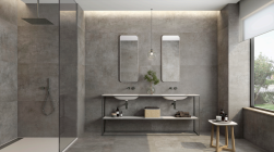 Łazienka wyłożona szarymi płytkami imitującymi beton z kolekcji Origine z kabiną prysznicową, szafką z dwiema umywalkami, dwoma lustrami, lampą wiszącą i oknem